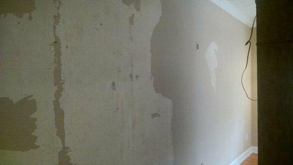 Before photo of peeling wall