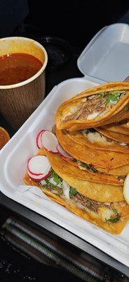 Birria tacos with consume.