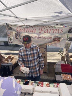 Gama serving up their farm fresh eggs at Mar Vista Sunday Farmers Market