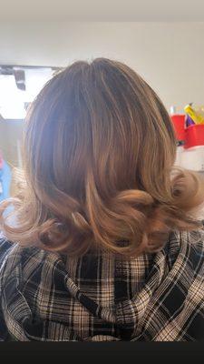 Highlights and blowdry with rollers.