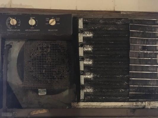 This is the broken AC unit that clearly has never been cleaned or replaced. Disgusting.