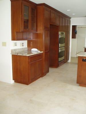 Cherry Kitchen with Granite Tops and Tile Floor