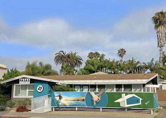 Outdoor Real Estate mural for Pasas Properties, OBSD, Ocean Beach, San Diego. Surf mural, surfer girl, Sunset Cliffs, hummingbird, local art