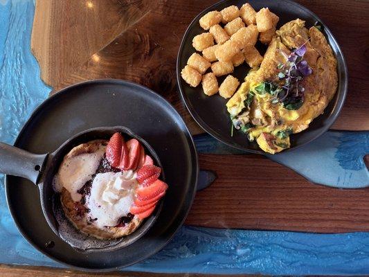 Dutch baby pastry in a skillet and brunch omelette with tater tots!