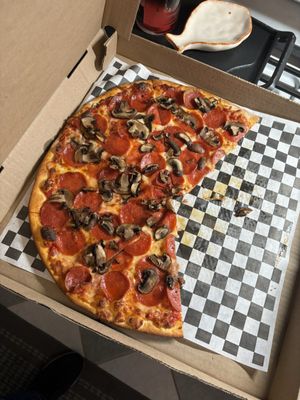 Pepperoni, mushrooms. Thin crust