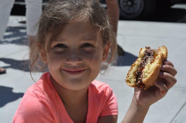 Enjoying one of Kepner Farms sirloin beef burgers.