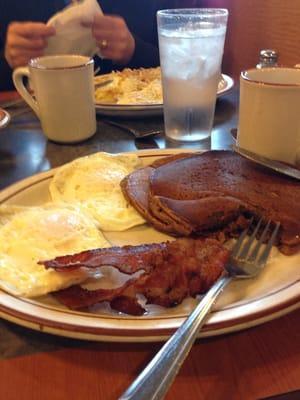 First bite of pumpkin pancakes. Yummy