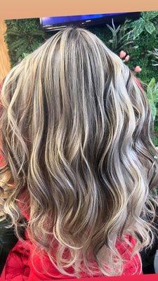 All over highlights blonde and dark brown low lights