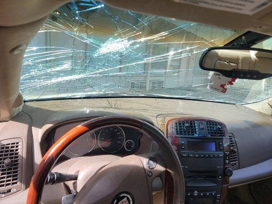 Cadillac CTS smashed windshield.