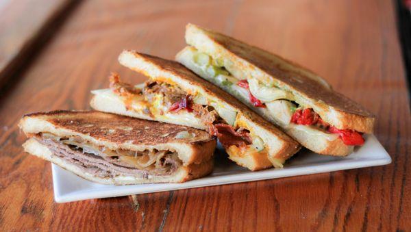 Pressed, hot and melty sandwiches all served with a mountain of pub chips