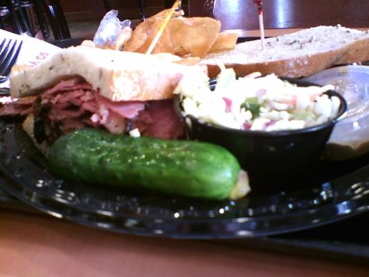 Pastrami and half sour and slaw