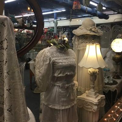 Victorian styled dressed up in display at one of the antique stores that remains open on this night