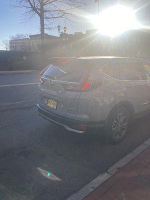 Person with key having this license plate, opened the store and let white male inside