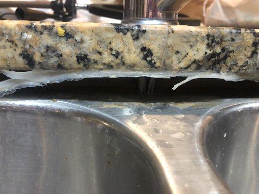 This happened due to plumber neglecting to tighten the undercounts after replacing the kitchen faucet. See Review.