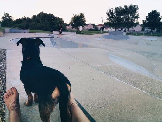 Kelly and I watching my boyfriend skate at the skate park.