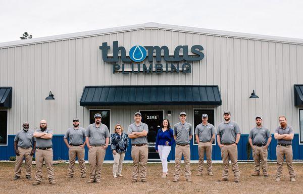 The Thomas Plumbing and Pipe Lining team in front of their main office in Raeford, NC.