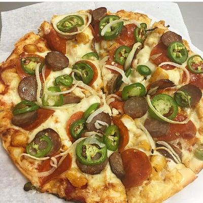 Pepperoni sausage chicken jalapeños onions