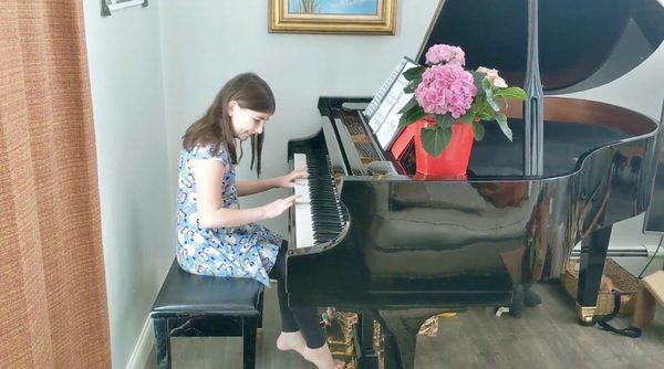 Gwen (9) performing at home for one of the studio's online recitals!