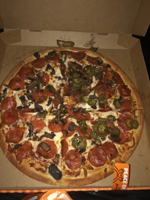 Pepperoni mushroom jalapeño pizza