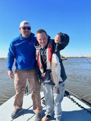 Family Time!  Jacob with his 1st fish!