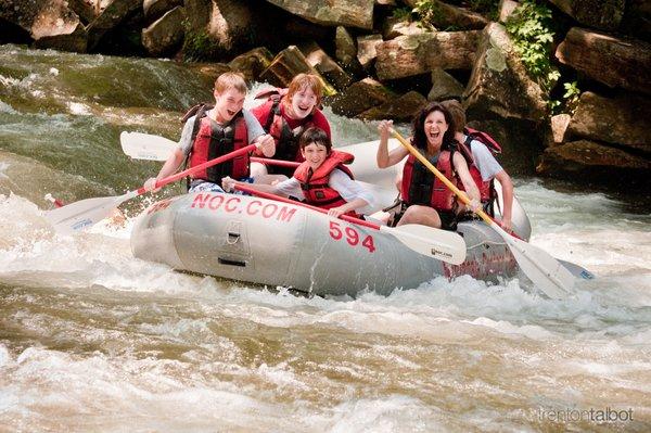 Birthday family portrait while white water rafting.