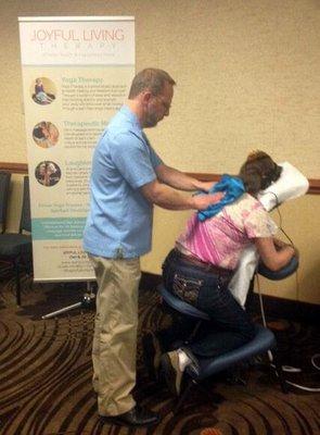 Chair massage at the holistic health and spiritually fair in Sioux Falls.