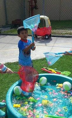 His favorite summer fun... water day!!