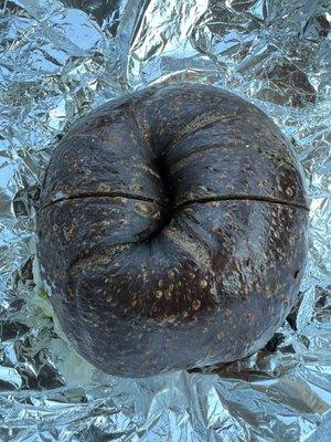 The most amazing pumpernickel bagel with scallion cc and tomato