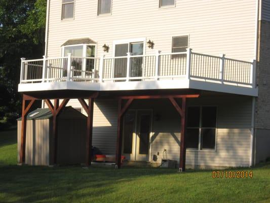 We installed the composite decking and used TREX railing system and adding the finish trim.