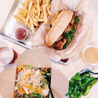 General tso chicken sandwich, seasoned fries, sesame salad, shishito peppers