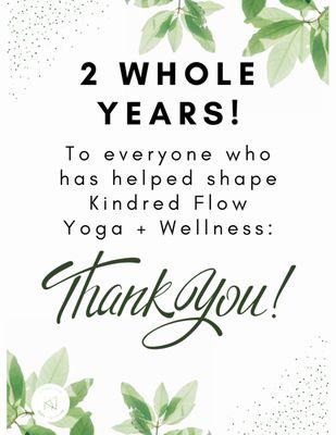 A picture frames with artful leaf work, stating our gratitude for supporting Kindred Flow Yoga + Wellness for the past two years!