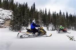 Snowmobile in the beautiful Black Hills.