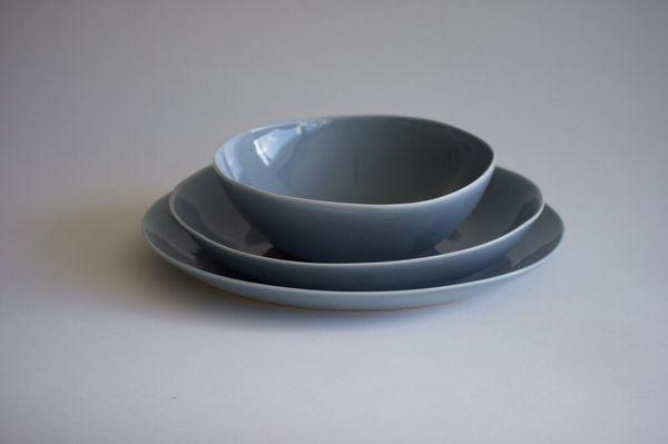 Bespoke dinnerware with a choice of 15 glazes set a unique table, handmade locally.