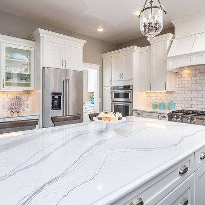 Beautiful kitchen with Brittanicca Cambria Quartz countertops.