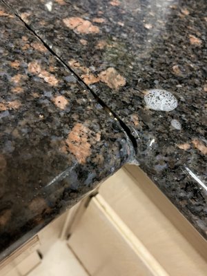 Counter tops not even aligned - roaches like to hide in there - bleached their hideout