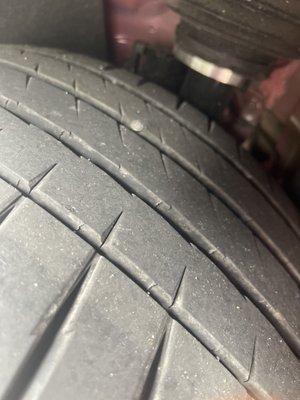 Tire with nail in it