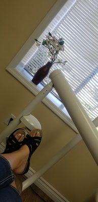 Enjoying the view - relaxing in the dental chair. Pretty flowers!  (* Blinds closed to reduce heat during heat warnings)