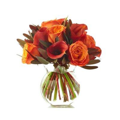 Fall in love with a new season - fall toned flowers now available!  Orange calla lilies, orange roses, and leucadendron.