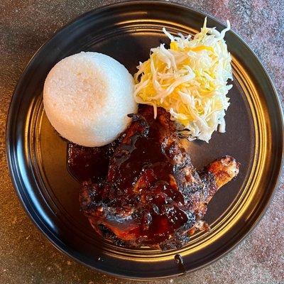 tamarind chicken, jerk seasoning, coconut rice, mango coleslaw