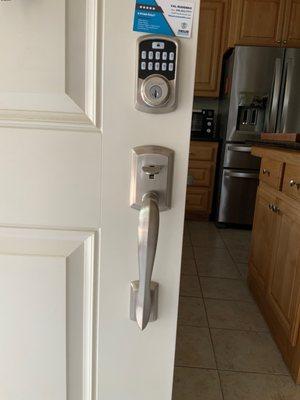 New front door electronic deadbolt and handset