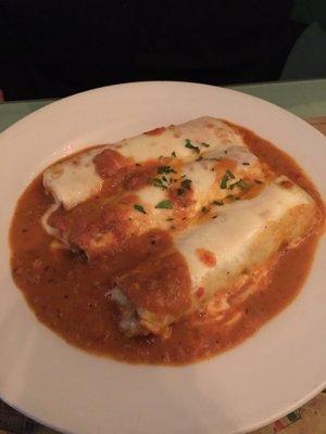 Beef and spinach cannelloni in a pink sauce