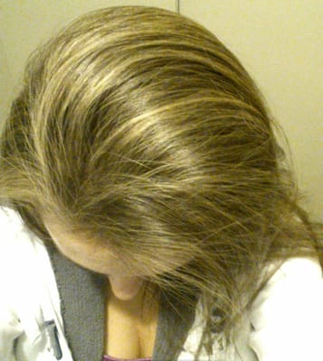 Caramel highlights with a deeper brown undertone.  I love!