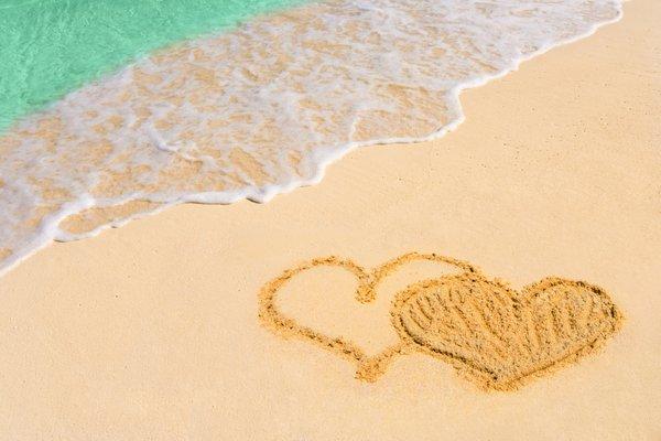 Two hearts in love on the beach.