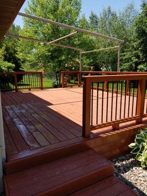 Cabots semi-solid oil based stain (Redwood)  on a cedar deck