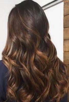 Balayage highlights, long layers, soft waves