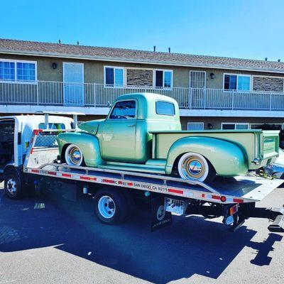 Classic car towing.