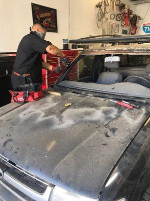 Older Toyota Tacoma having rust removed before Windshield install.