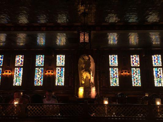 Main Dining area was uncomfortably too gothic dark. Cool stained glass windows.