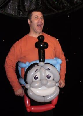 Thomas the train being worn by Denver balloons animal artist Zany