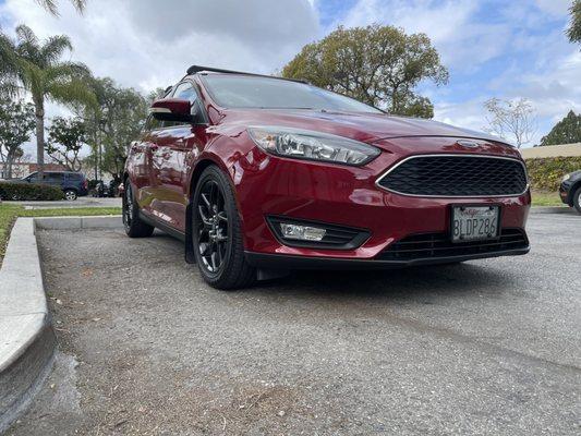 Image taken after I picked my car up from the shop. Bumper fixed + car wash.